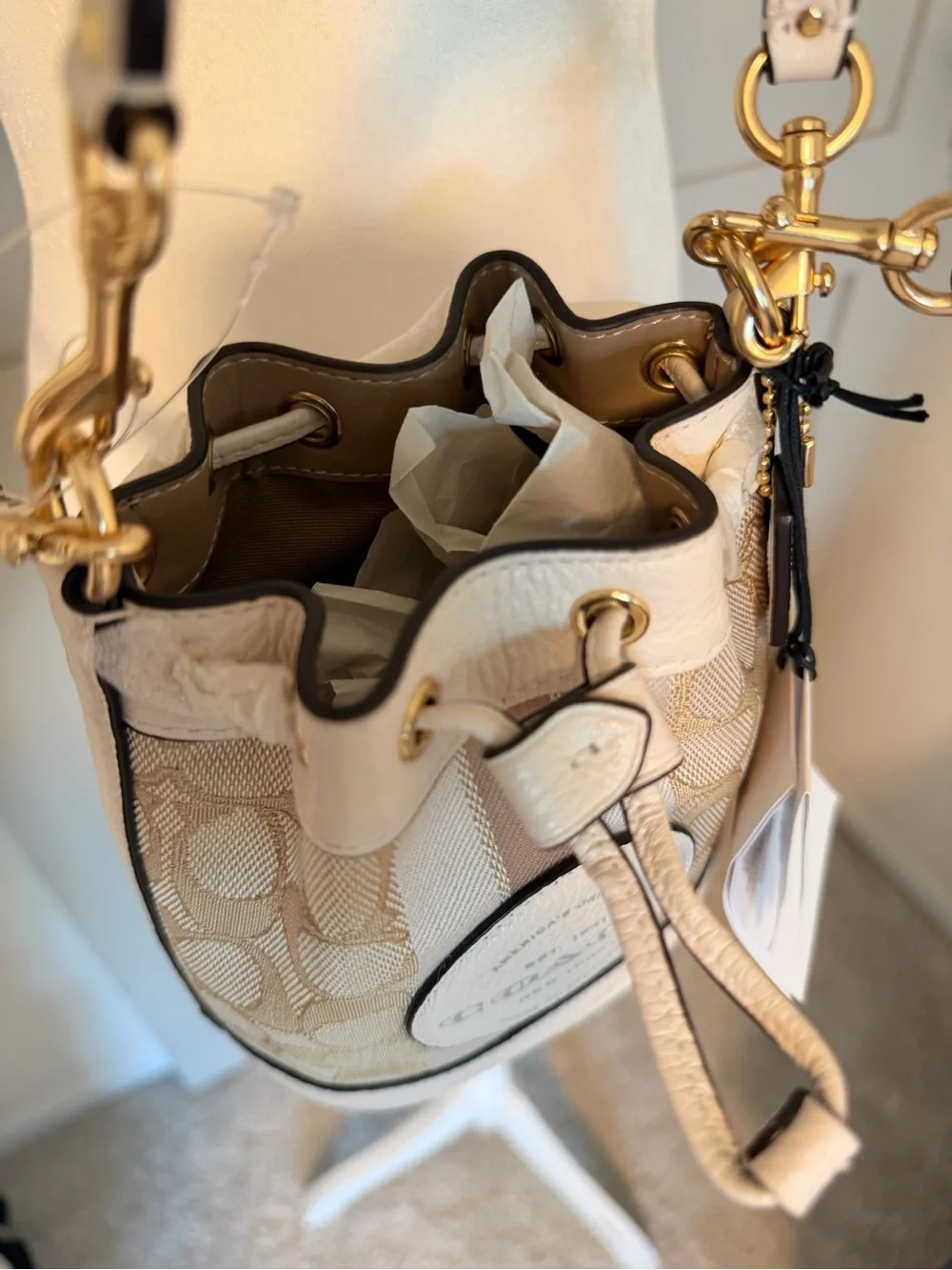 Coach Mini Dempsey Bucket Bag in Beige and White with Signature Logo